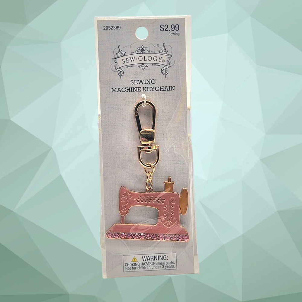 Brand New in Unopened Package~  Sew-ology ~ Pink  & Gold Sewing Machine Keychain
